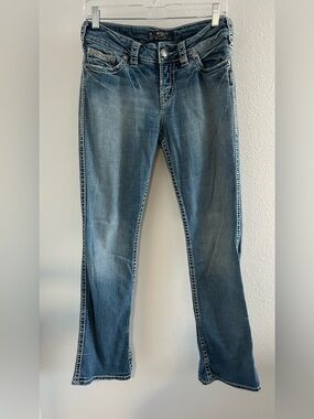 Silver Jeans Women's Faded Blue Boot Cut Jeans